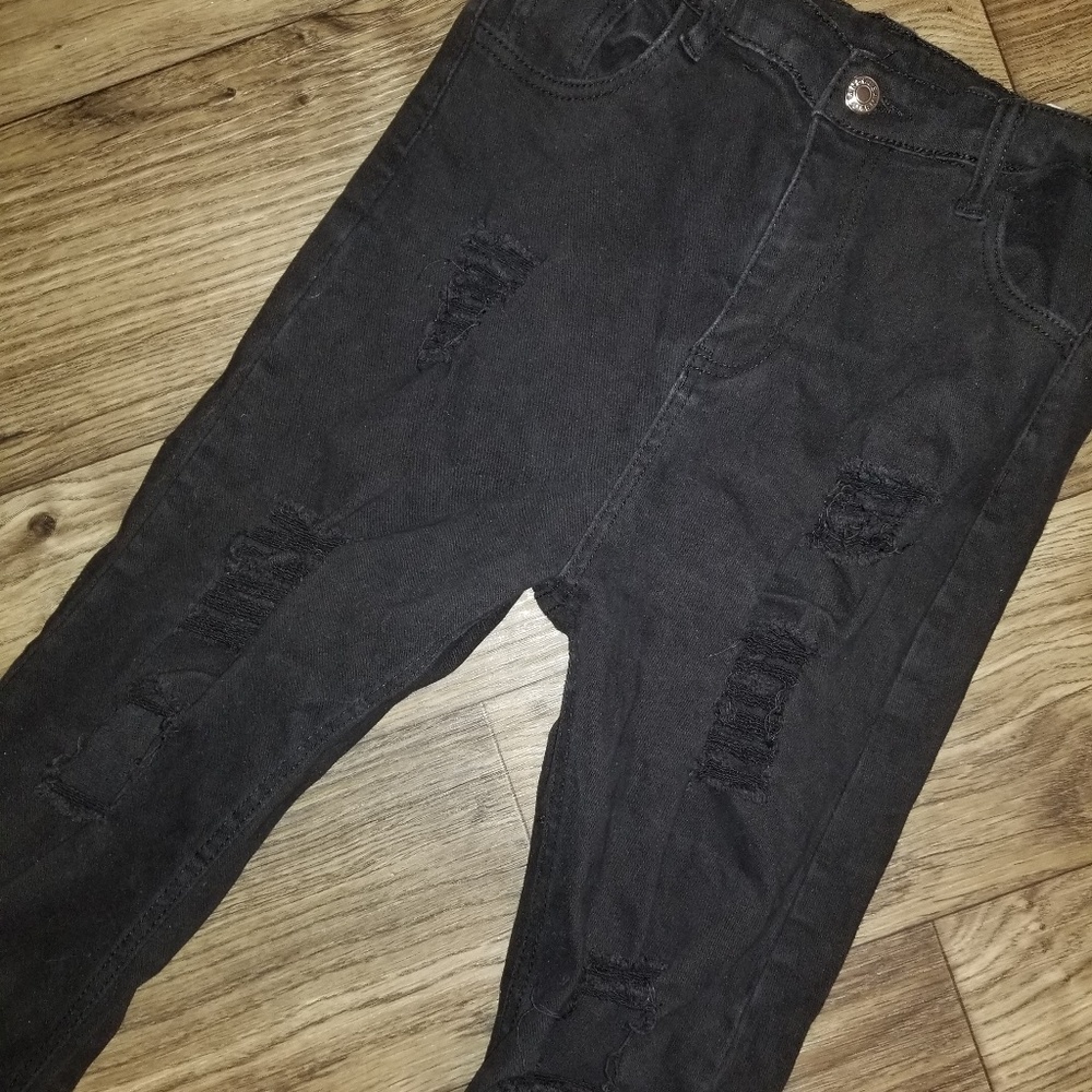 Distressed skinny jeggings
